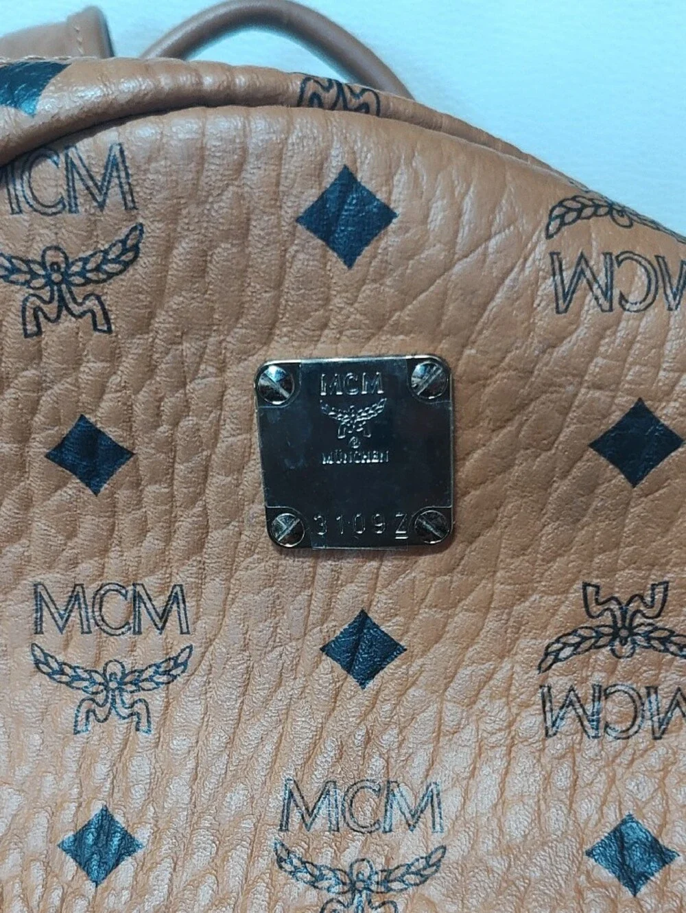 MCM Cognac Logo Print Leather Backpack with Gold Plate